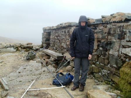 Setting up the aerials outside the hut