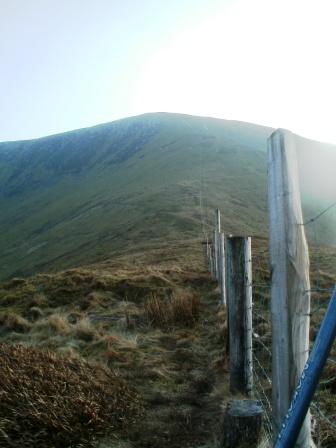 Looking along the saddle and up to the summit