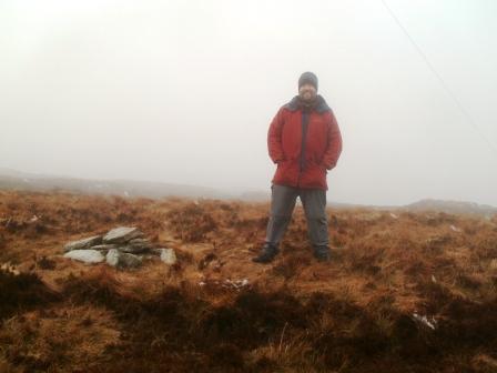 Tom reaches the summit