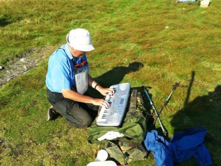 Man playing organ on the summit!