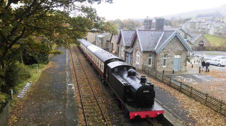 A train and old station, neither in current use