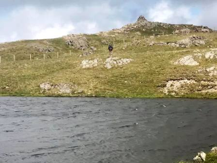 Jimmy by the tarn, just below the summit
