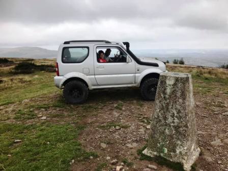 One of several vehicle visitors to the summit during the evening