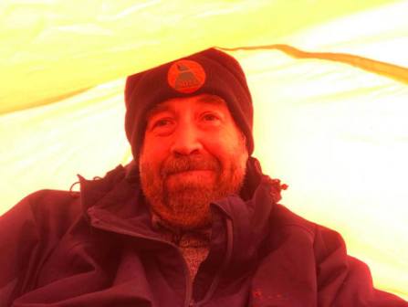 Tom sheltering in the bothy bag