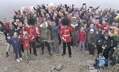 Jimmy is towards the right of the photo, in the red hat
