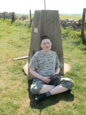 Liam at the summit of Cleeve Hill