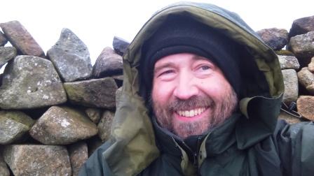 Short stay in the summit shelter at the start of the descent.