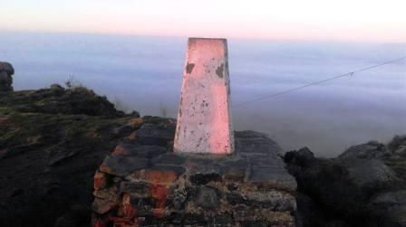 Cloud summit above the fog