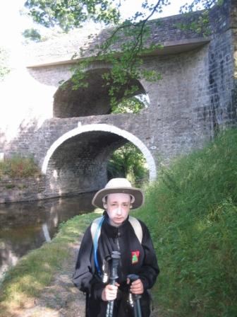 Jimmy by the double-arched bridge