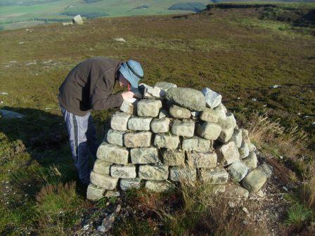 Jimmy writing in his logbook while in QSO