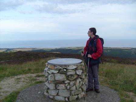 Jimmy on the summit, with a great view over the Moray Firth