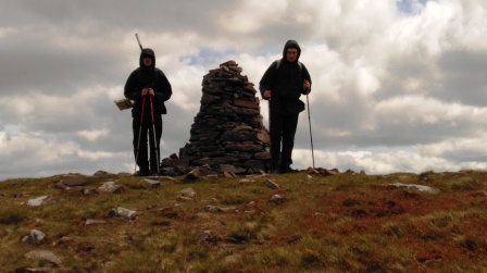 Jimmy & Liam at the cairn near the summit