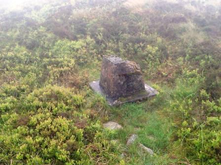 The base of the damaged trig point