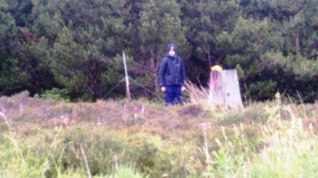 Jimmy setting up by the trig point