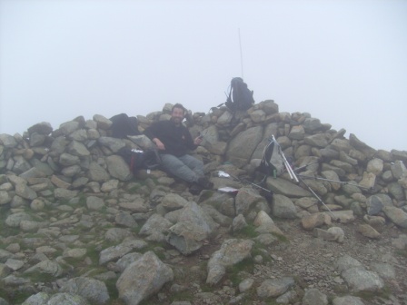 Tom M1EYP in the summit cairn/shelter thingy