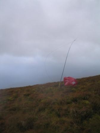 Richard G3CWI/P operates from inside his bothy bag on Great Mell Fell G/LD-035