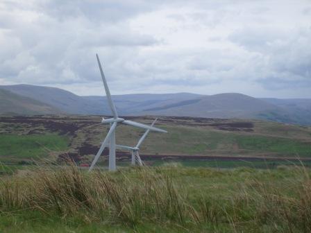 View towards the Howgills over the turbines and the M6