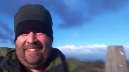 Tom at the trig point