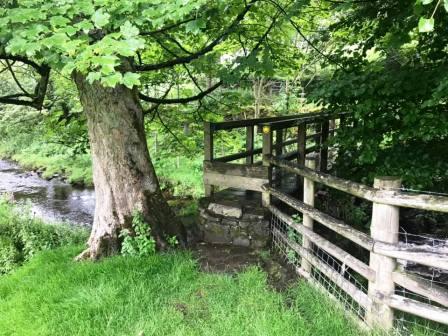 Footbridge out of Clough House Farm