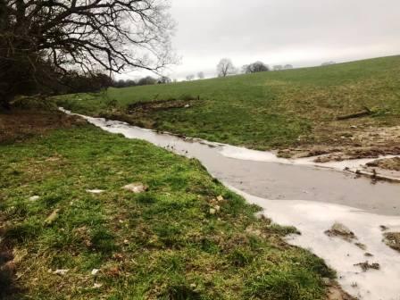 Entry into Underbank Farm - but get to the right-hand side of the stream!