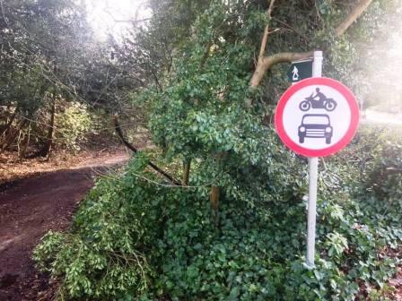 Public footpath down a muddy looking track