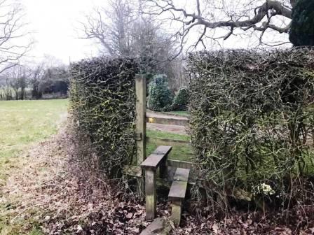 Public footpath exits onto an access driveway