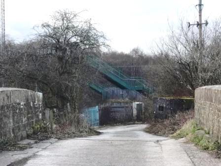 Footbridge over the railway ahead, viewed from the canal bridge on Gaw End Lane