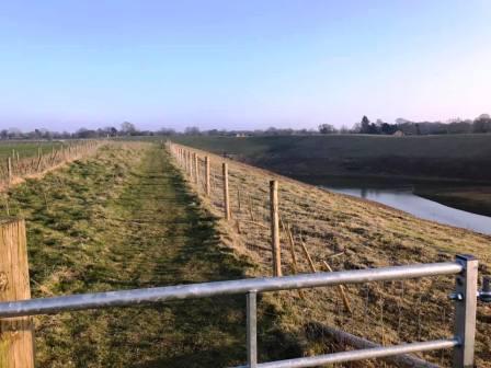 Unusual footpath curving around the top of the banks of Chelford Sand Quarry