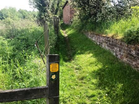Path starts to rise and veer slightly away from the railway