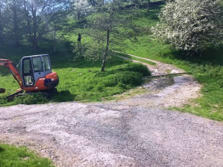 Turn right onto the slightly uphill track