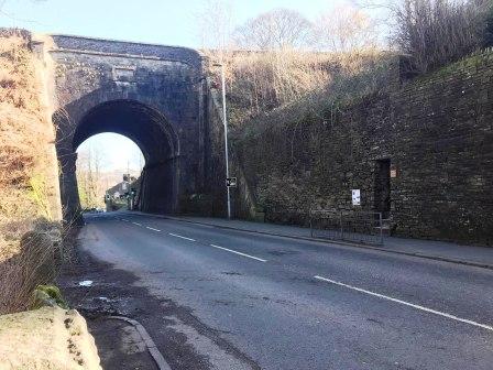 Cross the road before the aqueduct