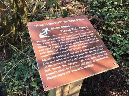 "Hole in the Wall" Heritage Steps information board