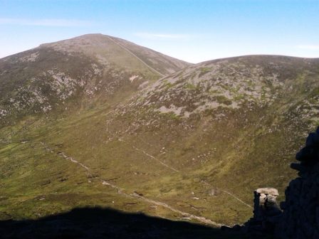 Rest stop on the final ascent, looking over the saddle to our next peak Slieve Meelbeg