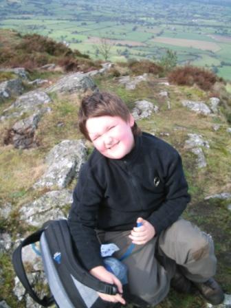 Liam on Moel y Golfa summit