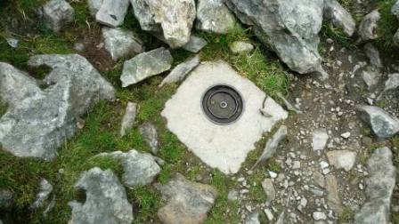 Triangulation point marker on the summit