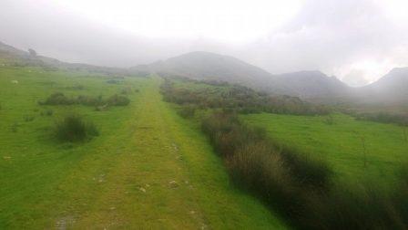 Onto the track across farmland up to the ridge