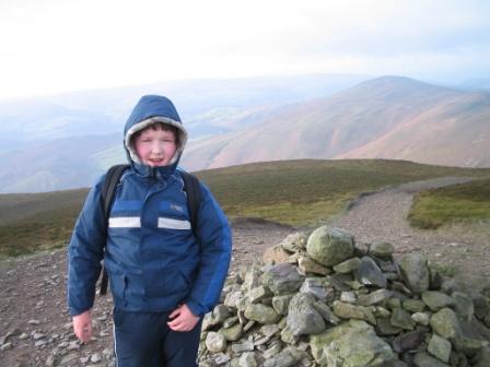 Liam at the summit of Moel y Gamelin