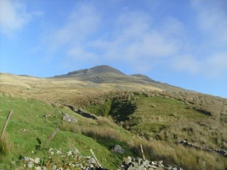 Looking back at the summit after descending the steep slope