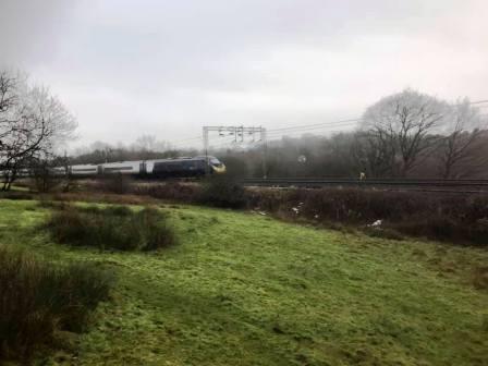 Train on the nearby railway line