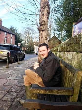 Liam outside St Peter's Church, Prestbury