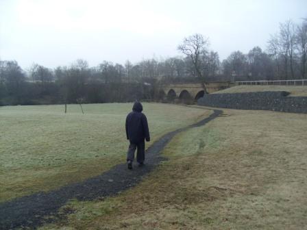 Liam walking down towards Bellingham bridge