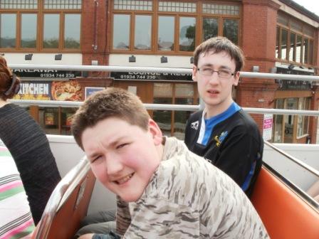 On the bus ready for the tour (with that evening's dinner venue in the background!)