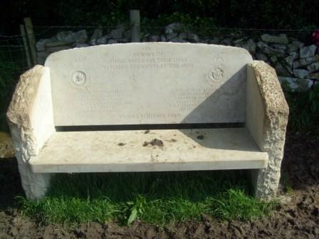 Air crash memorial stone bench en route