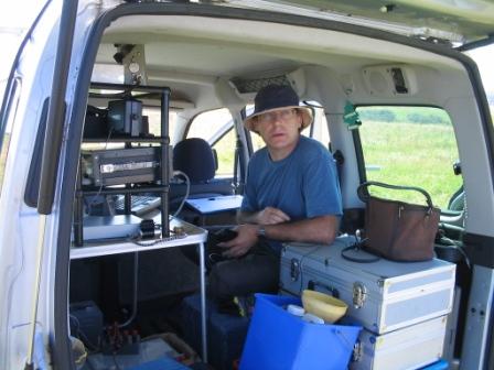 Bob G8VOI in the purpose-built shack within his car