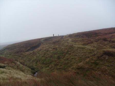 Pennine Way path snaking around towards Black Hill