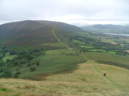 Looking back down towards the road, with Mynydd Llangorse SW-015 opposite.  Tom & Liam can be seen lagging behind on the ascent below.