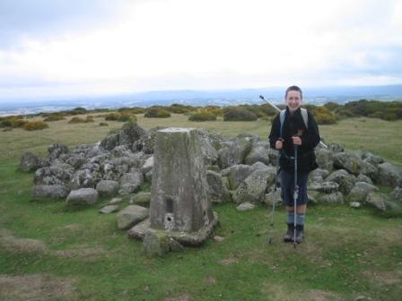 Jimmy visits the trig point early in the descent