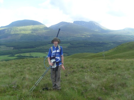 Jimmy on summit, with Ben Nevis behind