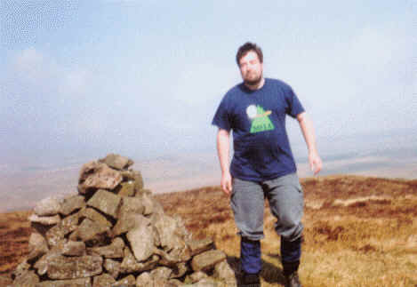 Tom at the summit cairn on Agnew's Hill AH-005