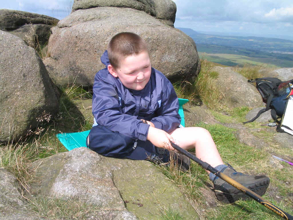 Liam sheltering on the summit